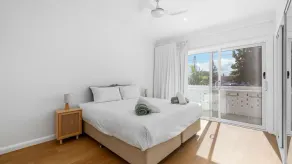 Experience the perfect blend of beachside charm and stylish holiday living - Image 4