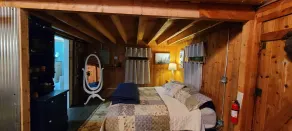Wood Haven Lodge. Secluded, cozy log cabin in Northern Michigan. - Image 4