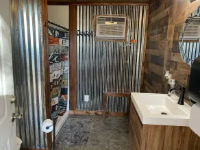 Small one room cabins with no bathrooms hot tub and covered picnic tables. - Image 3