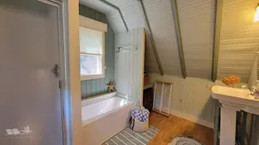 Experience lakeside luxury at Piffi Biff, a spacious 5-bedroom cabin on Southport, ME. - Image 4