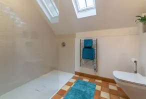 A light and airy property with a hammock and hot tub, situated on a working farm - Image 2