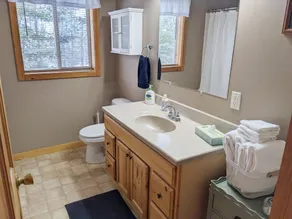 Room to gather inside and out with Rainy Lake access! - Image 4