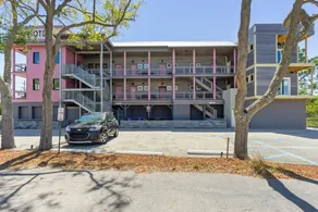 Boutique Hotel Folly Room 5: King Deluxe Studio - cozy porch views of the Folly River ADA - Image 4