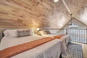 Highlights:<br>Private beach just steps from your door<br>Includes kayaks for exploring the lake<br>Great fishing right off the shoreline or dock<br>Bring your boat and enjoy full boating access<br>Cozy indoor fireplace for cool evenings<br>4 spaciou - Image 5