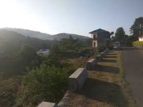 It  is surrounded by lush green mountains, with fruit garden & vegetable fields. - Image 3
