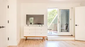 Head out East and live the good life in this renovated wooded oasis! - Image 2