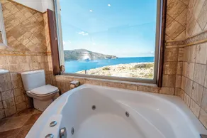Reihenhaus mit privatem Pool vor dem Meer - Image 3