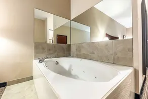 Comfort Meets Affordability at Red Lion Inn & Suites Mineral Wells! Onsite Pool! - Image 4