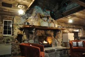 Cozy up in this rustic Stone Lodge and relax by the fireplace - Image 2