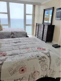 Une chambre sur la plage avec une impressionnante vue sur l'océan - Image 5