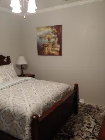 Cozy bedroom with private bathroom, and separate, direct access entrance. - Image 5