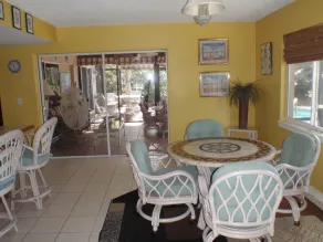 Lushly Landscaped Pool home Offers Tranquil Setting Yet Close to Beach - Image 5