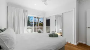 Experience the perfect blend of beachside charm and stylish holiday living - Image 4
