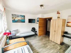 Spacious holiday home with 2 cozy apartments – space for up to 12 people. - Image 2