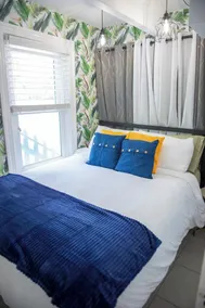 Stay steps from the sand in this charming single-family home.  Enjoy exclusive beach access at Sunburst Inn, featured on HGTV.  Cozy comfort for up to 4, and an unbeatable location on the Gulf. Perfect for a romantic escape or small family getaway. - Image 5