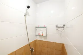 2 Bedrooms at Green Pramuka City Apartment By Travelio - Image 3
