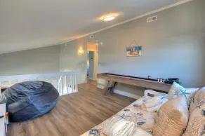 Experience oceanfront luxury at Happy Feet in Oak Island, with 4 bedrooms for 16 guests. - Image 2