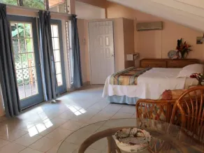 Sun West Villa, Coyaba Grand Suites - Sleeps 10 Shared Pool and Caribbean View - Image 2