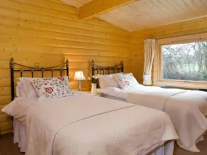 Deluxe Lodge with River view and Garden at Cherbridge Lodges – Riverside lodges - Image 3