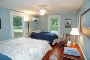 10 minutes from VIR. Great bass fishing! Rustic cottage on large private pond. - Image 5