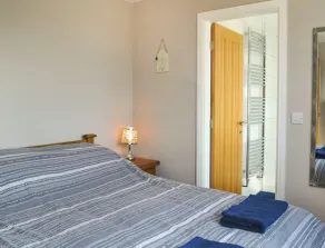 You will love this spacious semi-detached dormer bungalow with enclosed garden. - Image 5