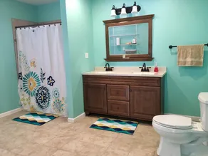 Experience Kentucky Lake out the back door! Spacious 4-bedroom retreat awaits. - Image 5