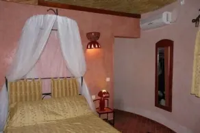 African hut comfort on estate with pool - Image 4