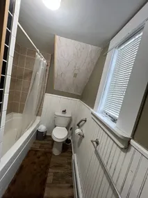 The Guides House • Cozy Main St Stay with Porch Views - Image 2
