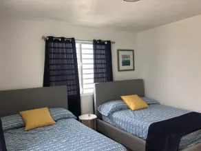 Nana’s Blue Beach Apartment is breazy, cozy and just minutes from the beach. - Image 4