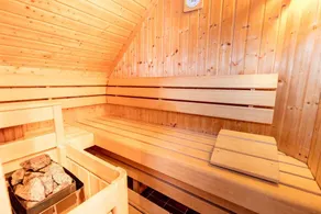 Feriehus med kakkelovn og wellness-oase - Image 2