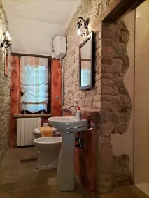 Enchanting natural stone farmhouse on a hill in the heart of the Marche region. - Image 2