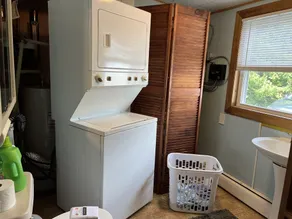 Escape to the Adirondack is a full house with parking and backyard. - Image 3