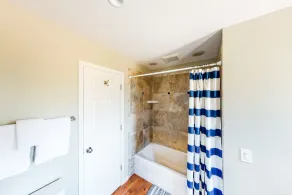 Inviting bayside dwelling with beach access, deck, waterfront views, & fireplace - Image 2