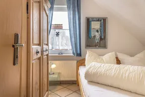 Away from the hustle and bustle of the coastal resorts, they can stay in this friendly upstairs residence - Image 5