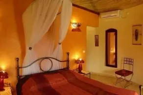 African hut comfort on estate with pool - Image 5