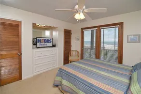 Hobbs Realty - The \"Sandlapper\" is an oceanfront home with two living areas and handicap ramps. - Image 2