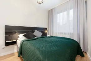 Spacious Apartment in Warsaw with Balcony and Parking by Noclegi Renters - Image 5