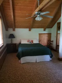 Charming Log Home with Pond on 27 Acres with Mountain Views - Image 4