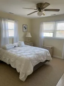 4 bedroom, 2 bath home is located in Avalon's north end and offers views of the inlet and the ocean from the large second floor deck. - Image 5