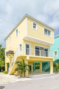 Yellow 3 Story Home - Image 2
