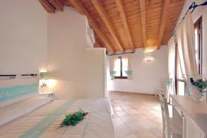 Studio apartment for 3 people of 30 m2 furnished in Sardinian style.Located on the ground floor with veranda and small garden or first floor with balcony.Consisting of living room with kitchenette, 2 joinable single beds, single sofa bed, bathroom.Endowe - Image 3