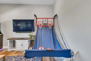 Stunning Lakefront Stay with Golf Cart, Private Hot Tub, Packed Game Room & Free Tickets Included! - Image 3