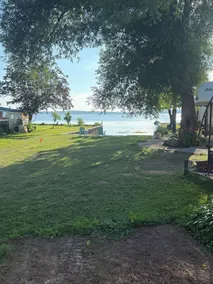 Waterview Trailer on Georgian Bay w/ kayaks and paddleboard and sandy beach - Image 2