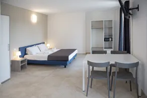 Junior Suite 1 with Shared Pool and Private Balcony - Image 5