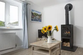Situated only sixty meters from the Blue Flag sandy beach in the charming coastal village of Porthto - Image 2