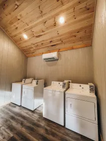 Cabin #6: Studio style layout with kitchenette and a large gravel parking pad beside the cabin for easy boat or trailer storage. - Image 2