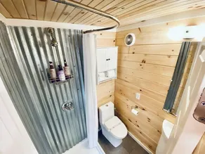 Tiny Container Home Retreat with Hot Tub, Fire Table, Dining Area, and Views! - Image 3