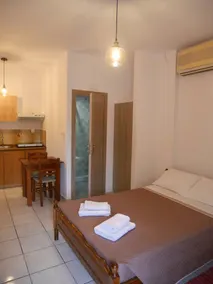 Chrysoula’s Welcoming Triple Room with Yard - Image 5