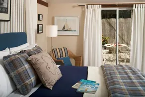 Plan Your Escape to the Cottage! Minutes to Mystic, Connecticut. This pet-friendly retreat has a private fenced-in rear garden patio. Your stay includes organic breakfast, firepit, hammock, and onsite hiking trails. Up to 2 well-behaved pets welcome! - Image 4