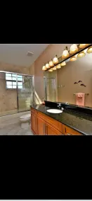 Spacious home with heated pool, and modern amenities. - Image 4
